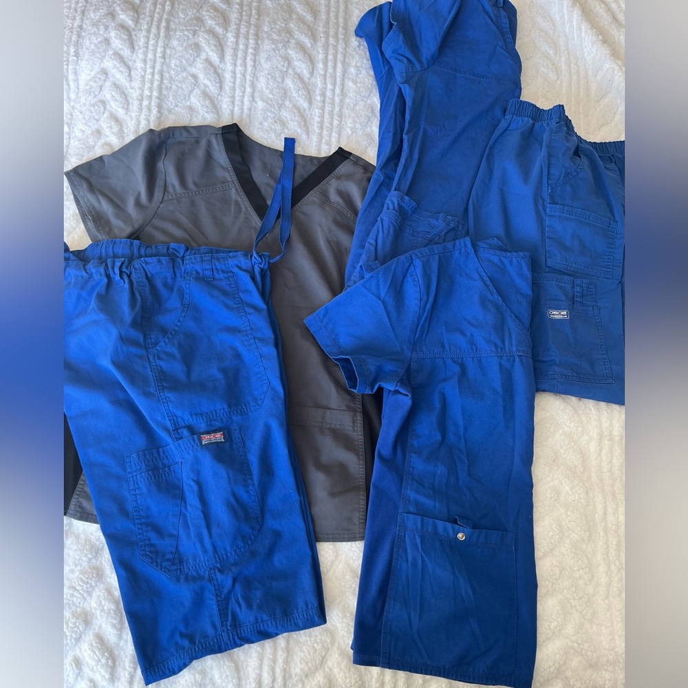 Scrubs two blue tops( medium)one large grey and black two blue bottoms